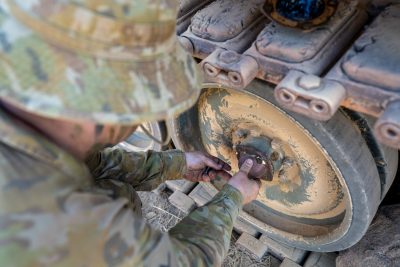 Spee3d Bradshaw 6911 Amcell Soldier Installing Spee3d Printed Wheel Bearing Part On M113